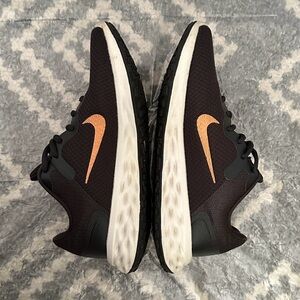 Nike Revolution Women's Running Shoes (Wide) with copper accents